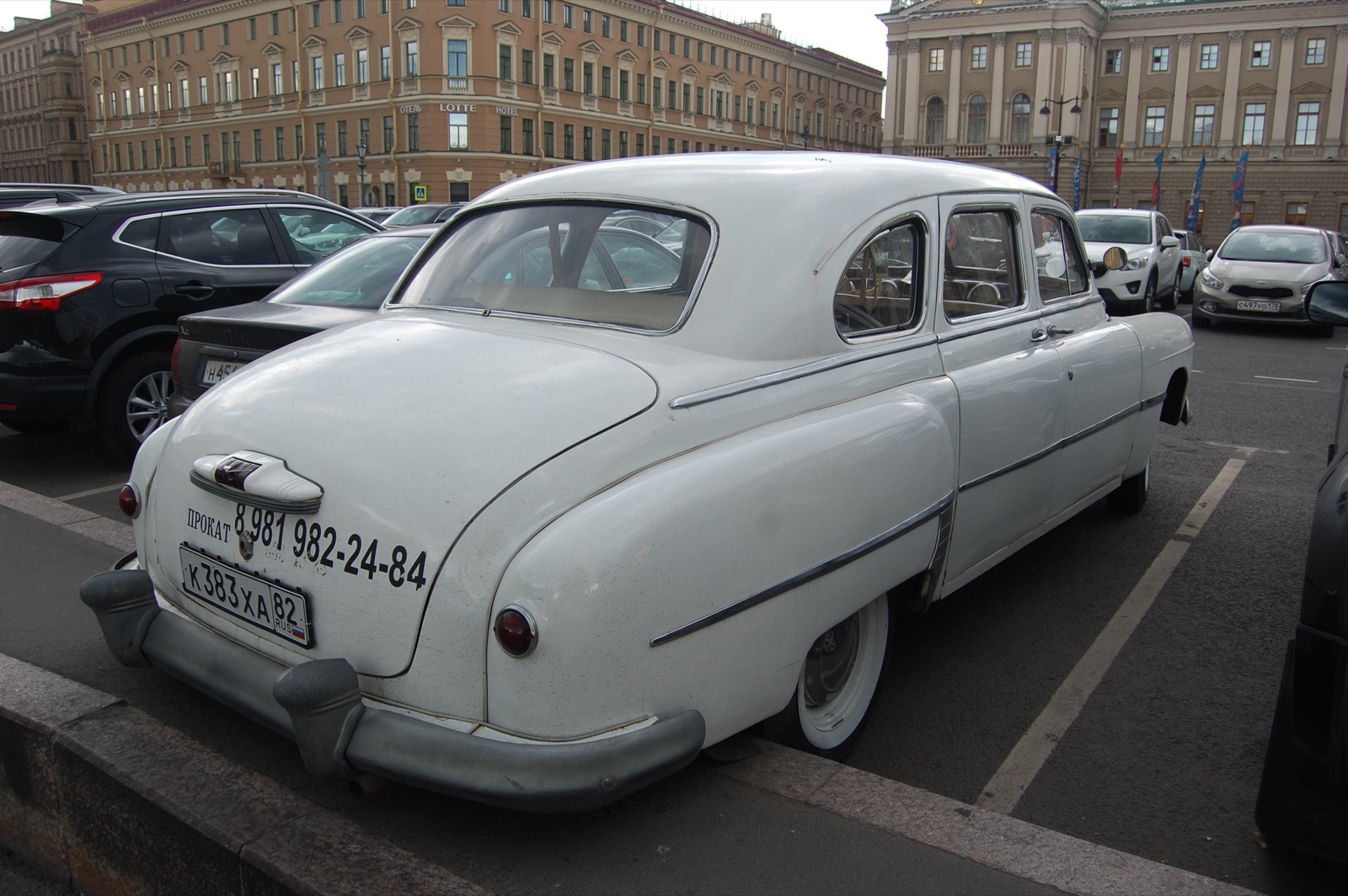 A 1950s Soviet saloon car parked on a St Petersburg street